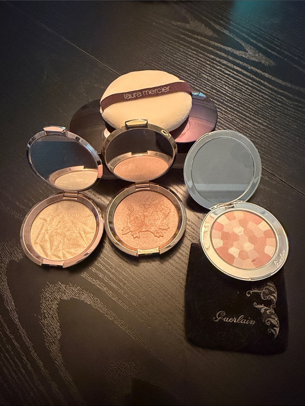 Guerlain, Becca and Laura Mercier powder and highlighter collection